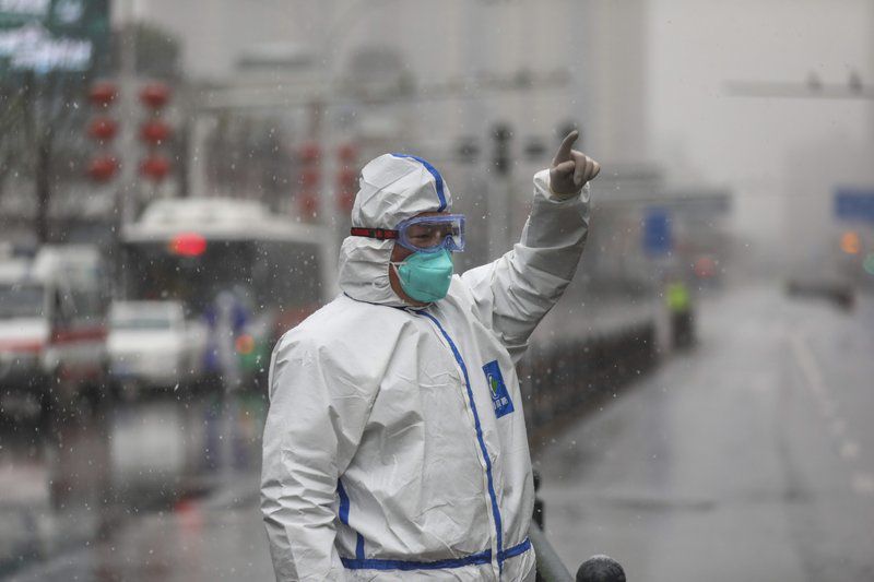 New virus cases fall; WHO says China bought the world time